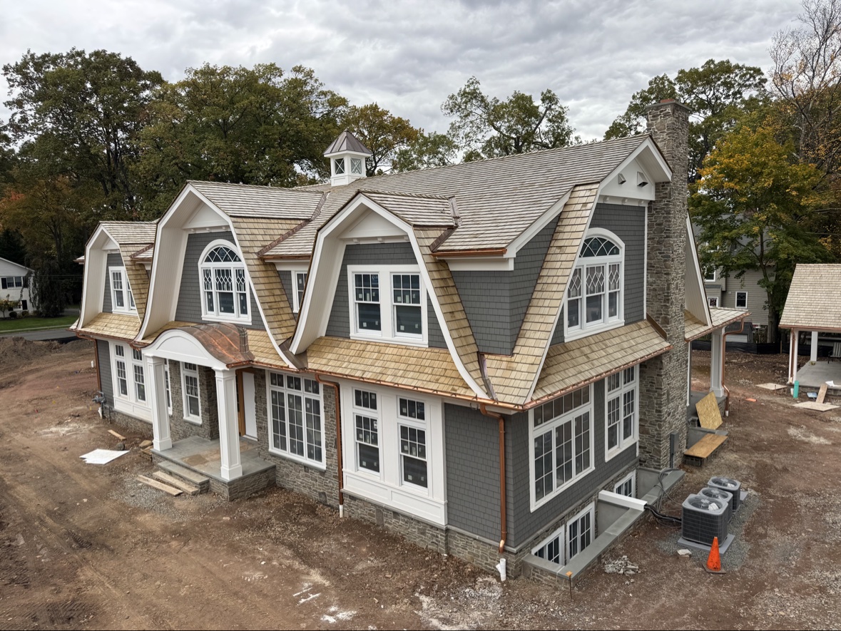 Cedar roof with copper gutters, wide view