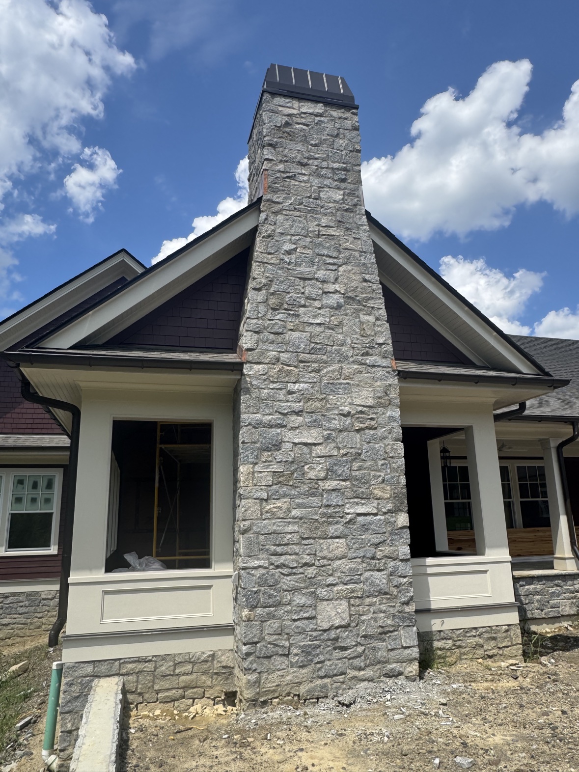 Construction management: stone chimney project oversight
